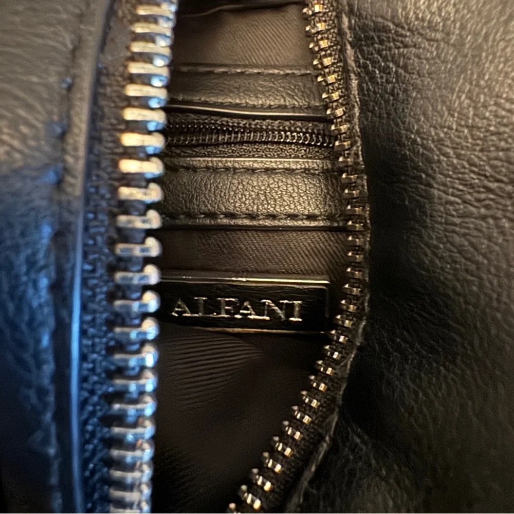Black Alfani Bangle Detail Sling Backpack